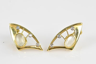 Lot 1367 - A pair of yellow metal diamond and moonstone...