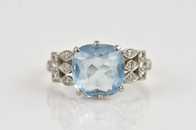 Lot 2441 - A white metal diamond set aquamarine cluster...