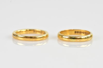 Lot 2348 - Two 22ct yellow gold wedding bands, size L and...