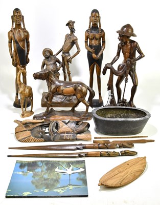 Lot 312 - A collection of African carved wood items and...