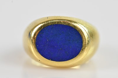 Lot 2293 - A yellow metal lapis lazuli set signet ring,...