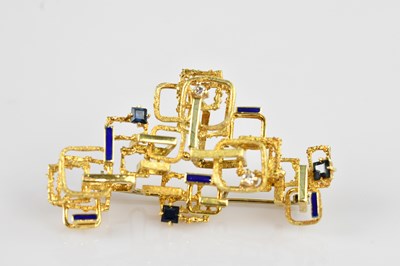 Lot 1264 - An 18ct yellow gold modernist brooch, set with...