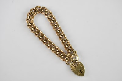 Lot 1119 - A 9ct yellow gold flat link bracelet with 9ct...