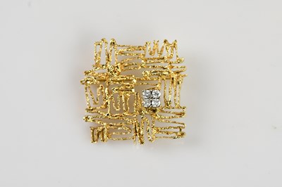 Lot 1278 - A yellow metal modernist abstract brooch, set...