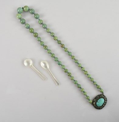 Lot 1085 - A Chinese turquoise beaded necklace, with...