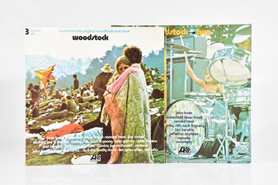 Lot 160 - WOODSTOCK; two albums comprising Woodstock...