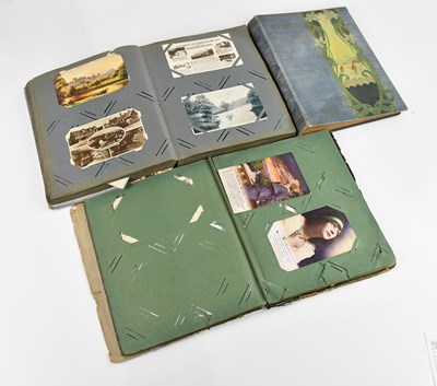 Lot 626 - Three postcard albums, two examples with...