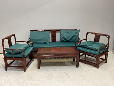 Lot 116 - A 1950s Chinese rosewood settee with open arms,...