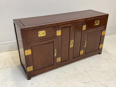 Lot 123 - A 1950s Chinese rosewood sideboard, with two...
