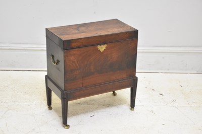 Lot 187 - A George III mahogany cellerette, height 57cm,...