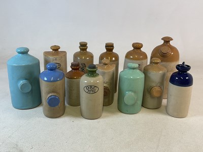 Lot 448 - A quantity of stoneware bed warming bottles,...
