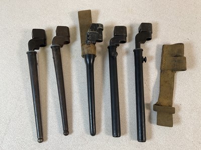 Lot 264 - Five spike bayonets with scabbards, two with...