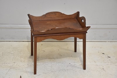 Lot 271 - An early 20th century mahogany tray table on...