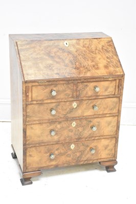 Lot 173 - An 18th century style burr walnut bureau, with...