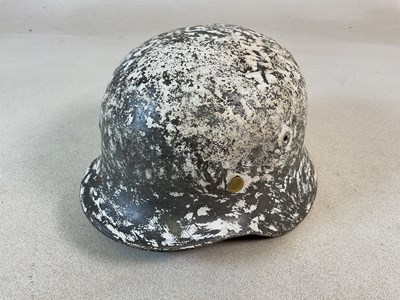 Lot 259 - A WWII German M35 army helmet, with lining and...