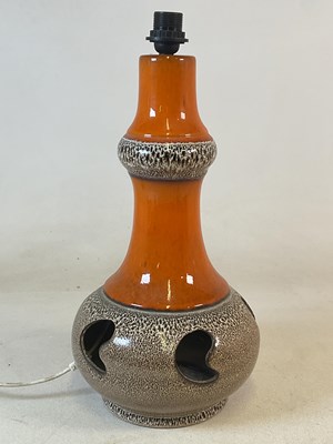 Lot 706 - A West German 1960s table lamp with orange and...