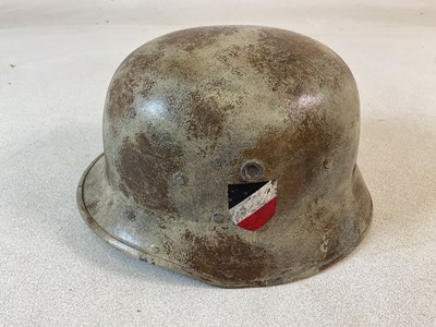 Lot 260 - A WWII German M35 helmet, made from molybdenum...