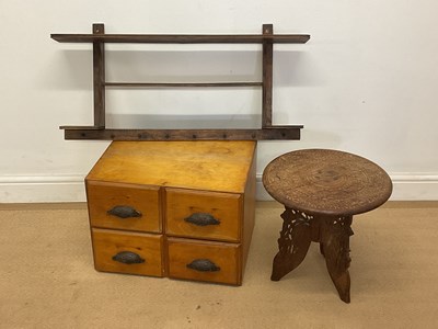 Lot 809 - An Anglo Indian carved wooden folding table,...