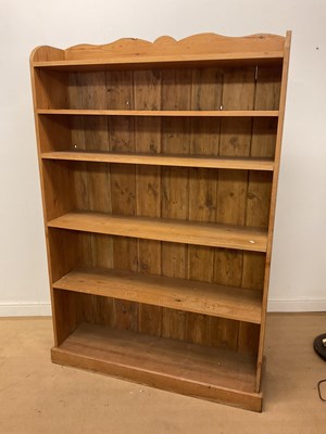 Lot 748 - A large pine open bookcase with four shelves,...