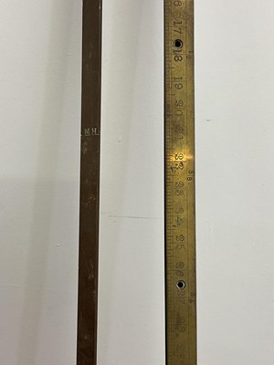 Lot 182 - Two railway brass oil/fuel measuring sticks,...