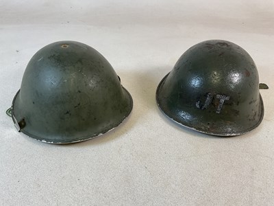 Lot 301 - Two WWII Dutch infantry helmets,without...