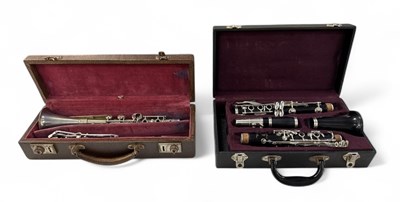 Lot 402 - SELMER OF PARIS; a cased stainless steel...