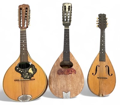 Lot 409 - Three mandolins of various sizes and forms,...