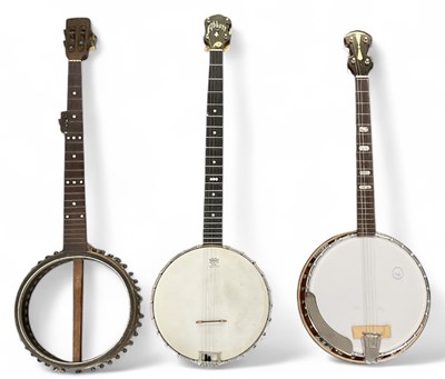 Lot 395 - Three assorted banjos, including one example...
