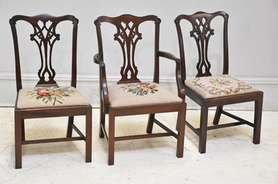 Lot 219 - A 19th century style Chippendale Revival elbow...