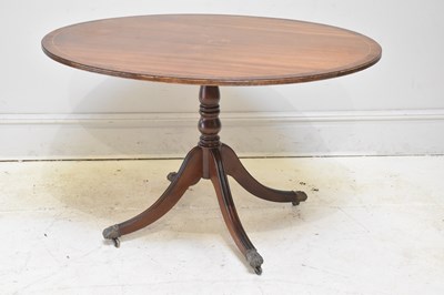 Lot 141 - A reproduction mahogany veneered breakfast...