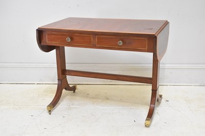 Lot 269 - A 19th century mahogany inlaid two drawer sofa...