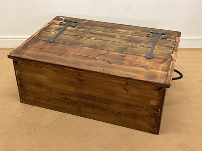 Lot 770 - A modern stained pine chest with rope handles...