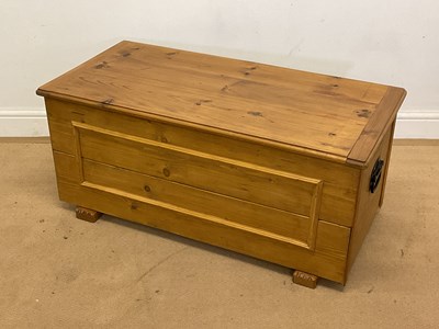 Lot 768 - A pine chest on carved feet, height 45cm,...