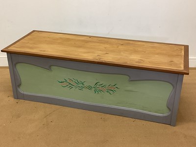 Lot 769 - A painted pine chest with metal handles and...