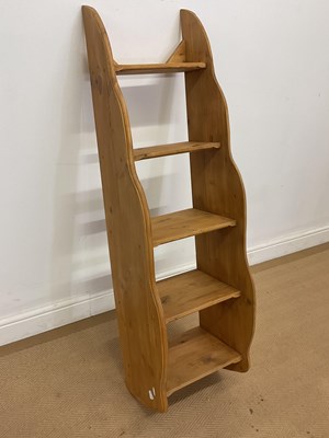 Lot 808 - A set of pine waterfall wall shelves, height...
