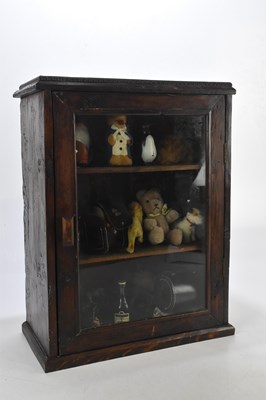 Lot 1106 - A collectors' cabinet containing vintage...