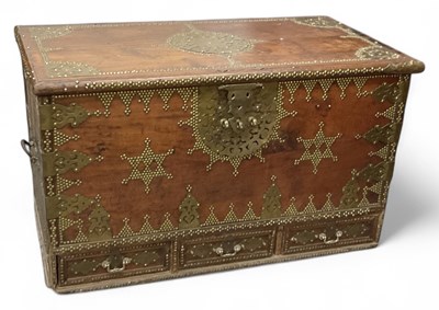 Lot 12 - An African hardwood Zanzibar chest, with brass...