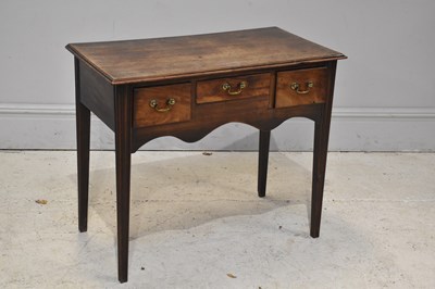 Lot 278 - A Georgian mahogany three drawer side table,...