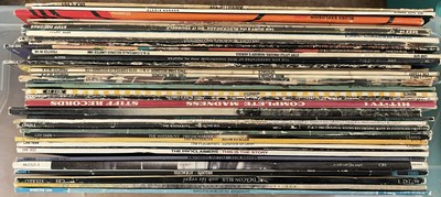 Lot 154 - A collection of forty records, to include The...