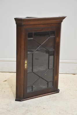 Lot 316 - A 19th century oak corner cabinet, height 95cm.
