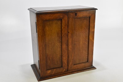 Lot 1069 - A 19th century oak medicine cabinet, 35 x 32 x...