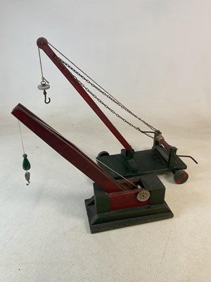 Lot 159 - Two scratch built wooden toy cranes, height 63cm.
