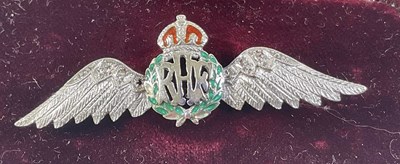 Lot 311 - SWEETHEART BADGES; a cased RAF white metal...
