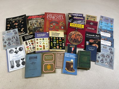 Lot 340 - A collection of books relating to military...