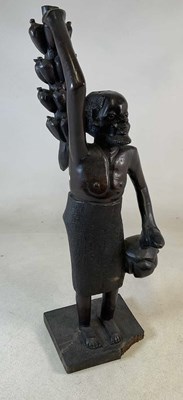Lot 337 - A large African hardwood carved figure of a...