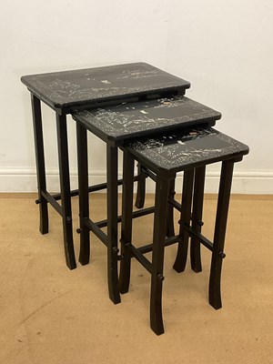 Lot 806 - A nest of Japanese black lacquered tables with...
