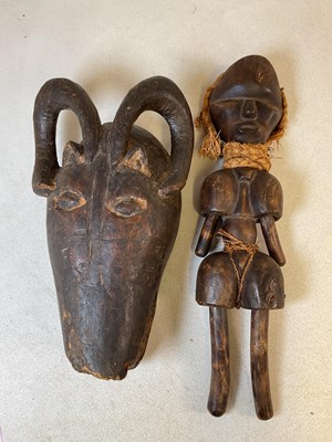 Lot 338 - A West African tribal mask together with a...