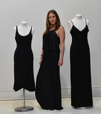 Lot 340 - GIORGIO ARMANI; a black knee length sleeveless...