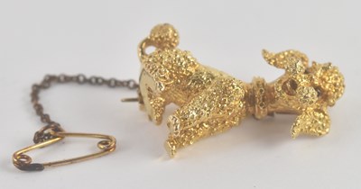 Lot 1440 - A 9ct yellow gold brooch in the form of a...