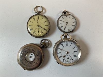 Lot 570 - A Silver half hunter crown wind pocket watch,...